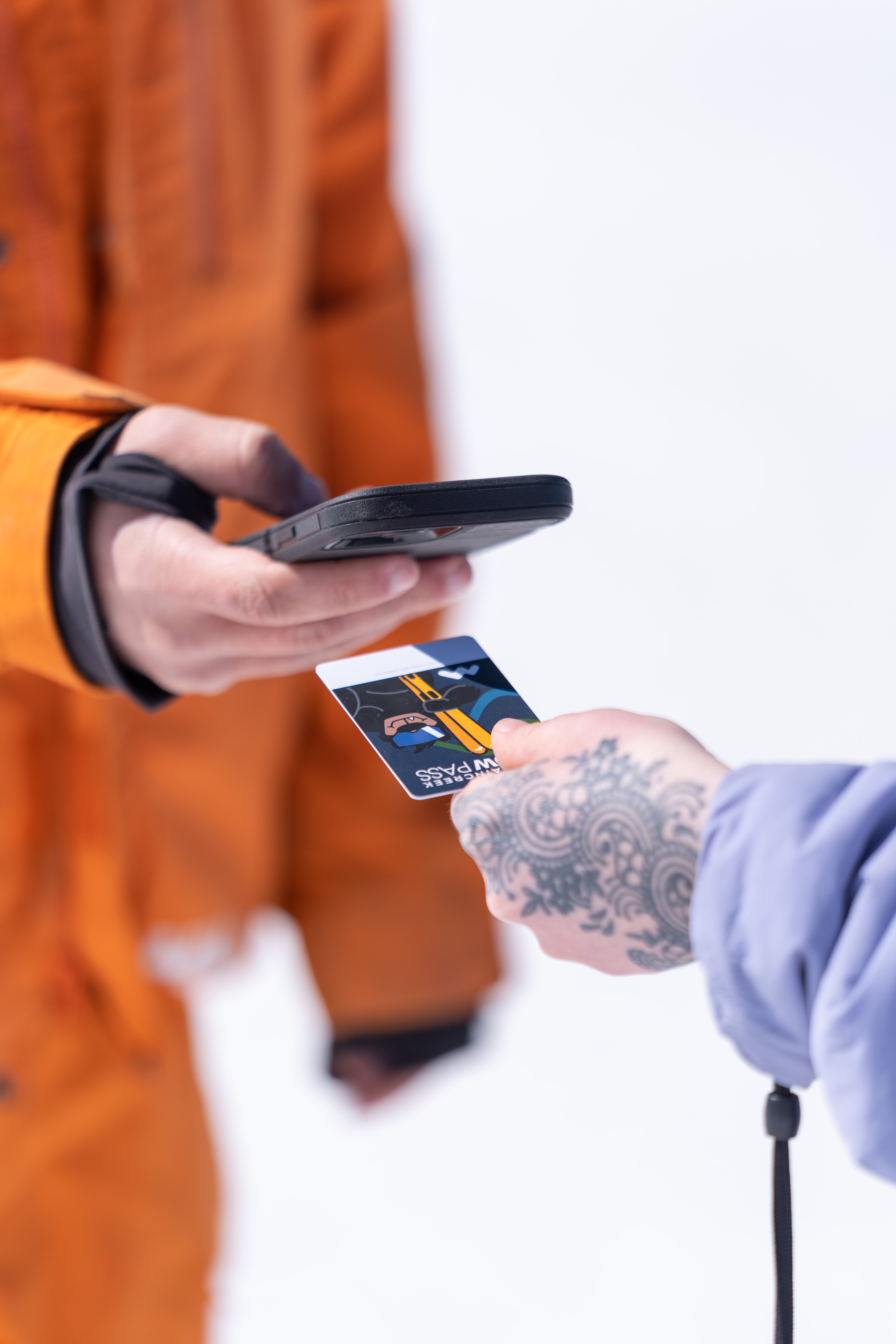 Scanning a customer NFC & RFID media card with SnowCloud on an iPhone.