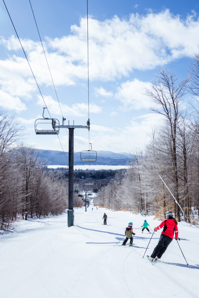 Skiers descending a trail at Oak Mountain.